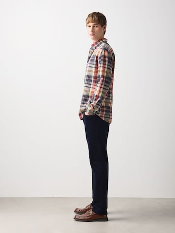 Next Slim fit Trousers 'Motionflex' in Blue