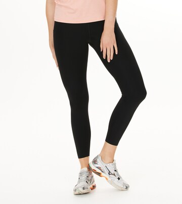 ENDURANCE Skinny Workout Pants in Black: front