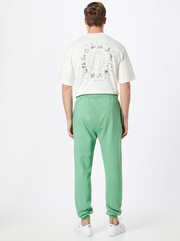 ABOUT YOU Limited Loose fit Trousers 'Marlon' in Green