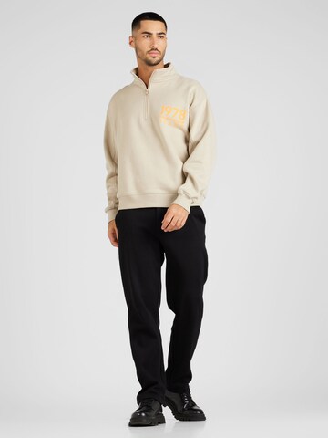 Calvin Klein JeansSweater majica - bež boja