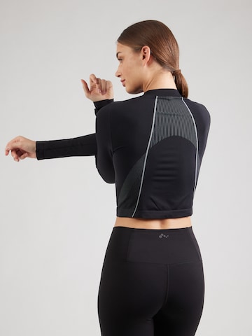 Maglia funzionale 'Vanish' di UNDER ARMOUR in nero