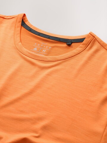 Maglia funzionale di Next in arancione