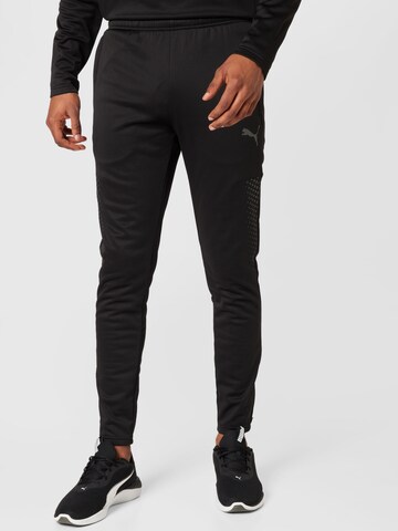 PUMA Slim fit Workout Pants in Black: front