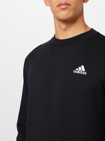 melns ADIDAS SPORTSWEAR Sportiska tipa džemperis 'Essentials French Terry Embroidered Small Logo'