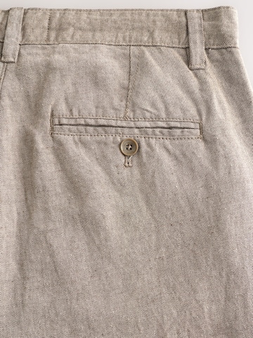 Next Tapered Housut värissä beige