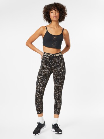 Skinny Pantalon de sport NIKE en noir