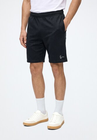 Karl Kani - regular Pantalón 'Signature' en negro: frente