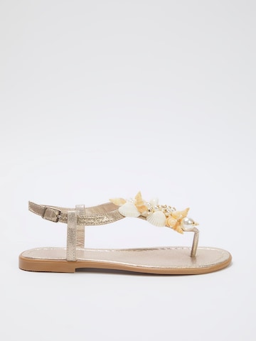 Tongs Trendyol en or