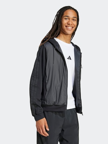 ADIDAS SPORTSWEAR Sportjacke 'ESS' in Schwarz: Vorderseite