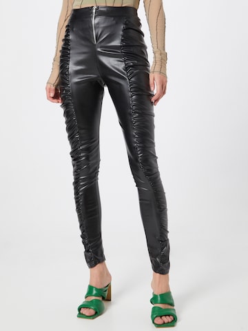 Femme Luxe Skinny Trousers 'KIANA' in Black: front