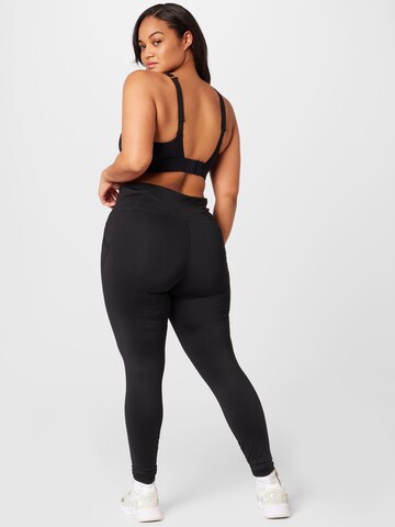 PUMA Skinny Sporthose in Schwarz