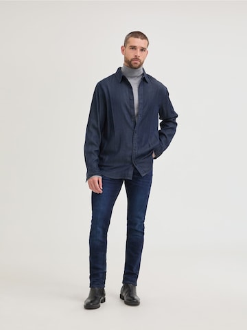 GUESS Slimfit Jeans 'Finnley' in Blau