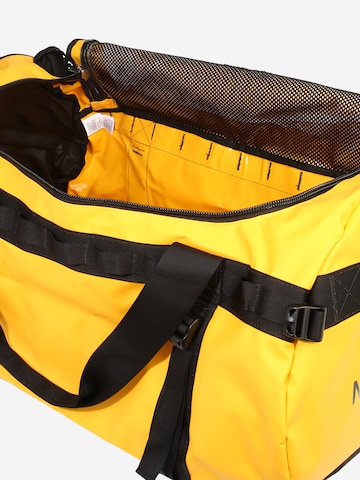 THE NORTH FACE - Bolsa de viaje 'Base Camp' en amarillo