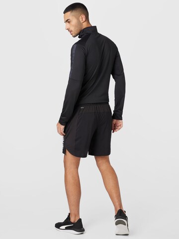 PUMA Regular Sportshorts in Schwarz