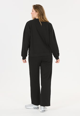 NOU Sweatshirt 'Vacay' in Schwarz