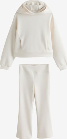 Next Set i beige: framsida