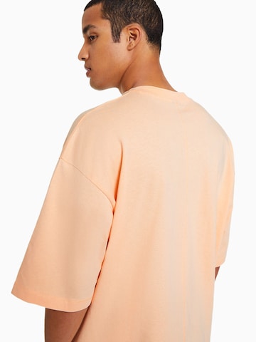 Bershka Тениска в оранжево