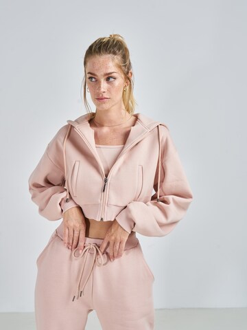ABOUT YOU x Swalina&Linus Zip-Up Hoodie 'Lotte' in Pink: front