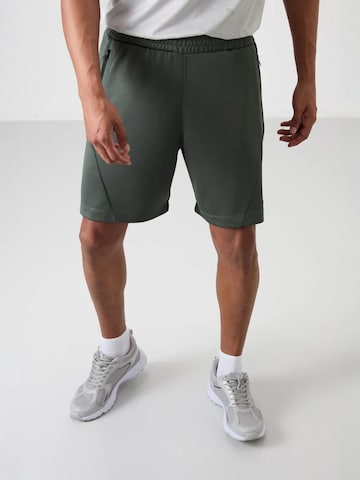 Regular Pantalon de sport Tommy Life en vert : devant