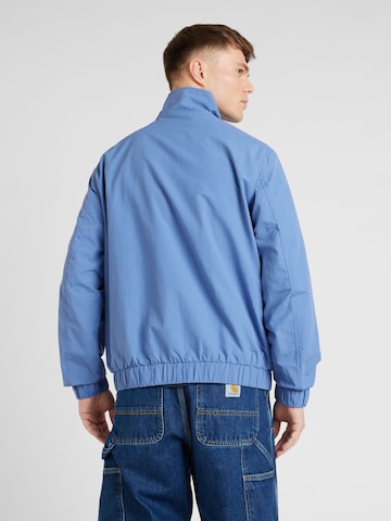 Tommy Jeans Overgangsjakke 'ESSENTIAL' i blå