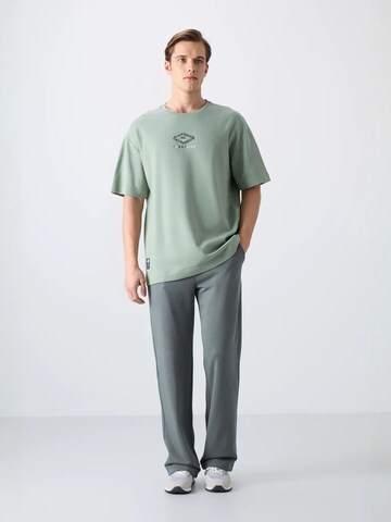 T-Shirt Tommy Life en vert