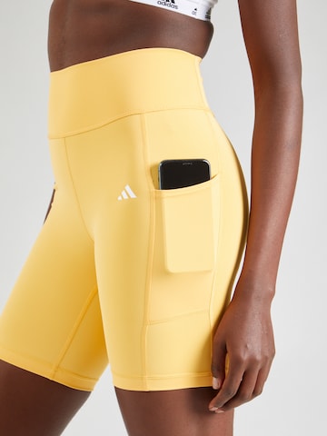 ADIDAS PERFORMANCE Skinny Workout Pants 'Optime' in Yellow