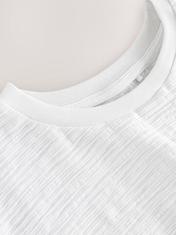 T-Shirt Next en blanc