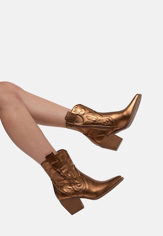 Salinyang Comwboystøvler i guld