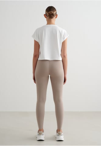 Maglia funzionale di Aim'n in bianco