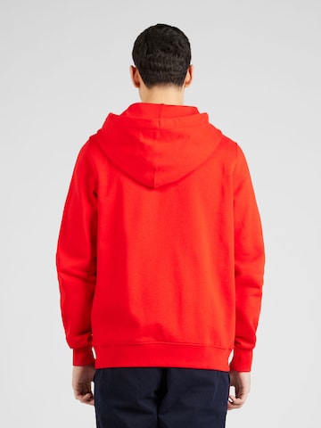 TOMMY HILFIGER - Sudadera con cremallera 'Varsity Arched' en rojo