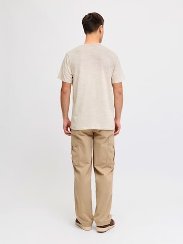 JJ Rebel Koszulka 'JREBWINDOM' w kolorze beżowy