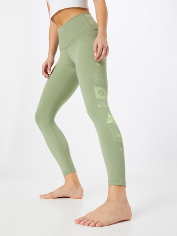 NIKE Skinny Sports trousers in Green: front