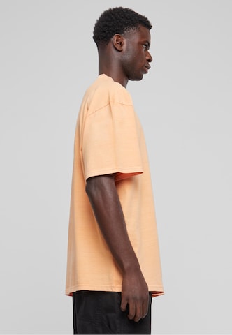 Maglietta 'Small Signature' di Karl Kani in arancione