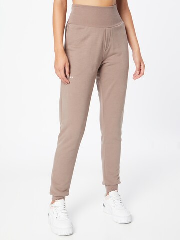 NEBBIA Tapered Sports trousers 'Feeling Good' in Brown: front