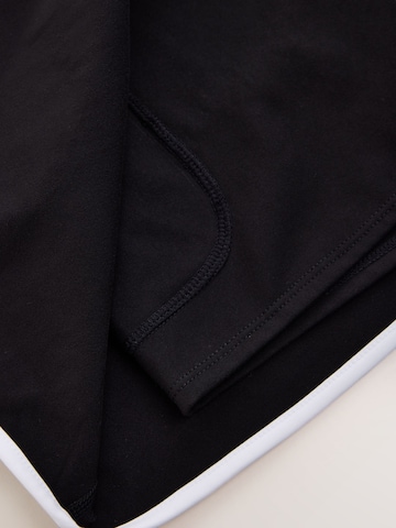 Next - Falda deportiva en negro