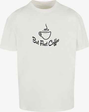 Merchcode Shirt 'But First Coffee' in Wit: voorkant