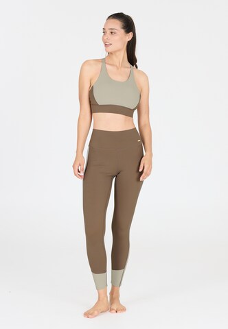 Athlecia Skinny Sports trousers 'Aspasia' in Brown