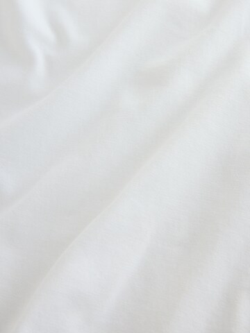 T-Shirt Next en blanc