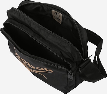 Sac de sport Reebok en or