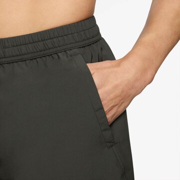 NIKE Regular Workout Pants in Green