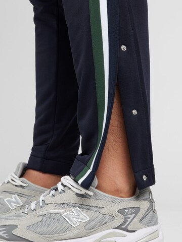 Tapered Pantaloni sport 'ACE' de la BJÖRN BORG pe albastru