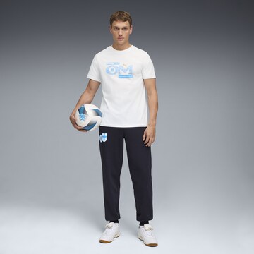PUMA Tapered Sportbroek in Zwart