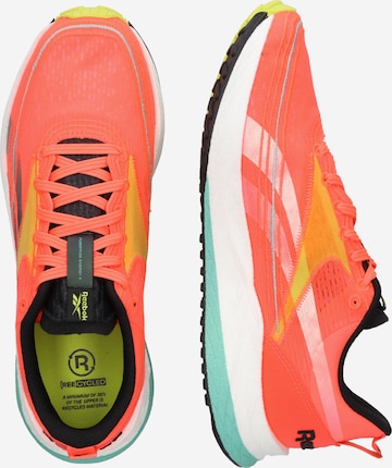 Sneaker de alergat 'Floatride Energy 4' de la Reebok pe portocaliu