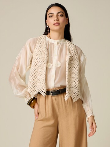 Gilet oltre en beige : devant