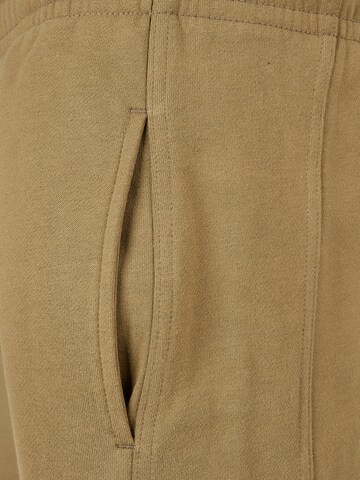 Tapered Pantaloni di Urban Classics in verde