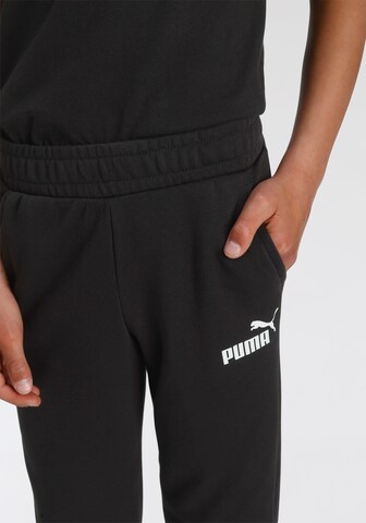 Tapered Pantaloni 'Essentials' di PUMA in nero