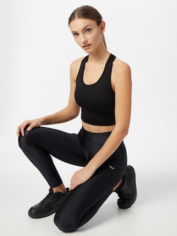 Skinny Pantaloni sport de la Röhnisch pe negru