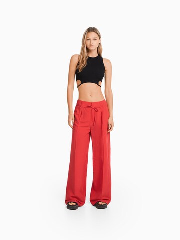 Bershka Zvonové kalhoty Kalhoty se sklady v pase – červená