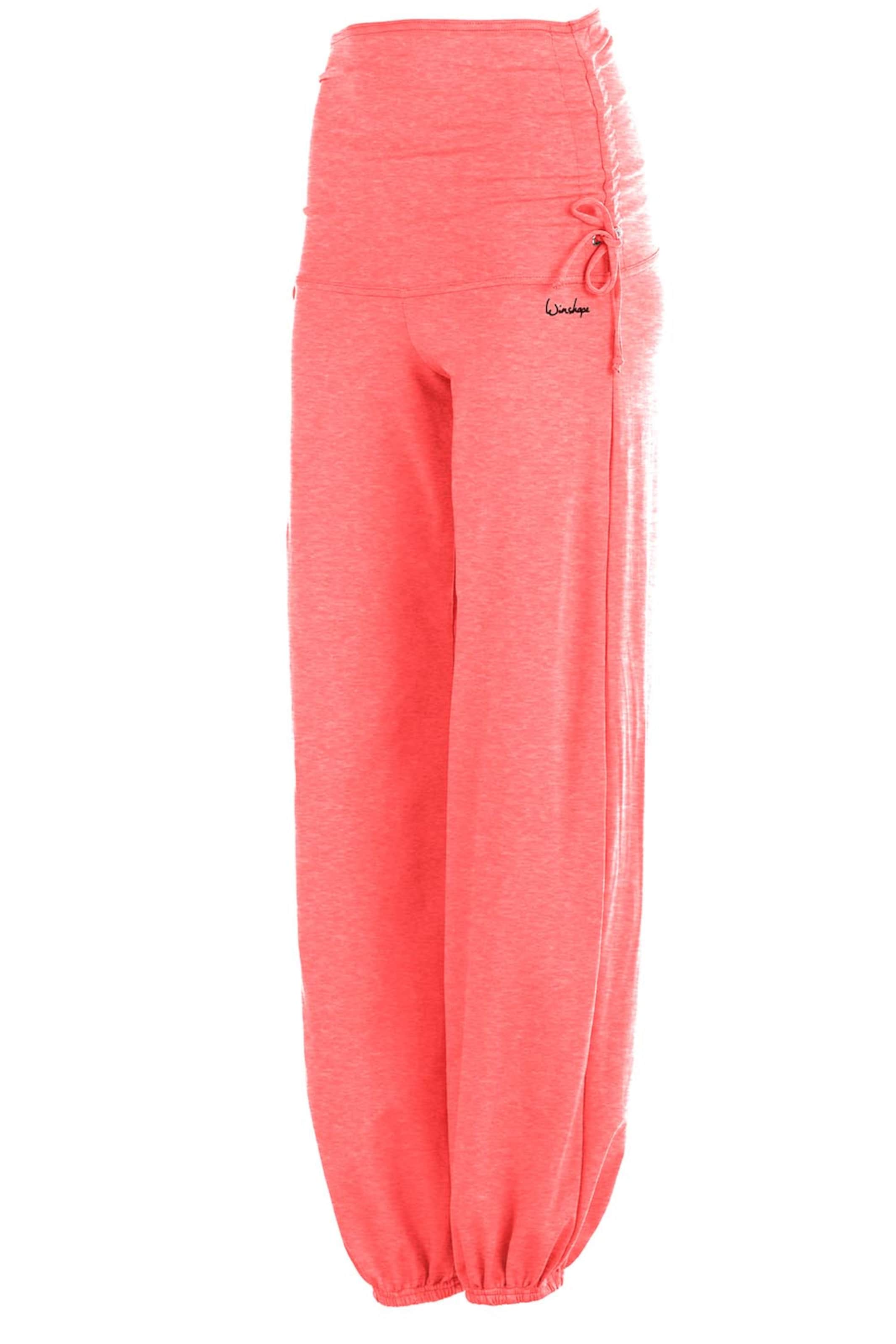 Winshape Дънки Tapered Leg Спортен панталон 'WH1' в оранжево