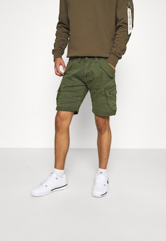 ALPHA INDUSTRIES Regular Cargo Pants 'Combat' in Green: front
